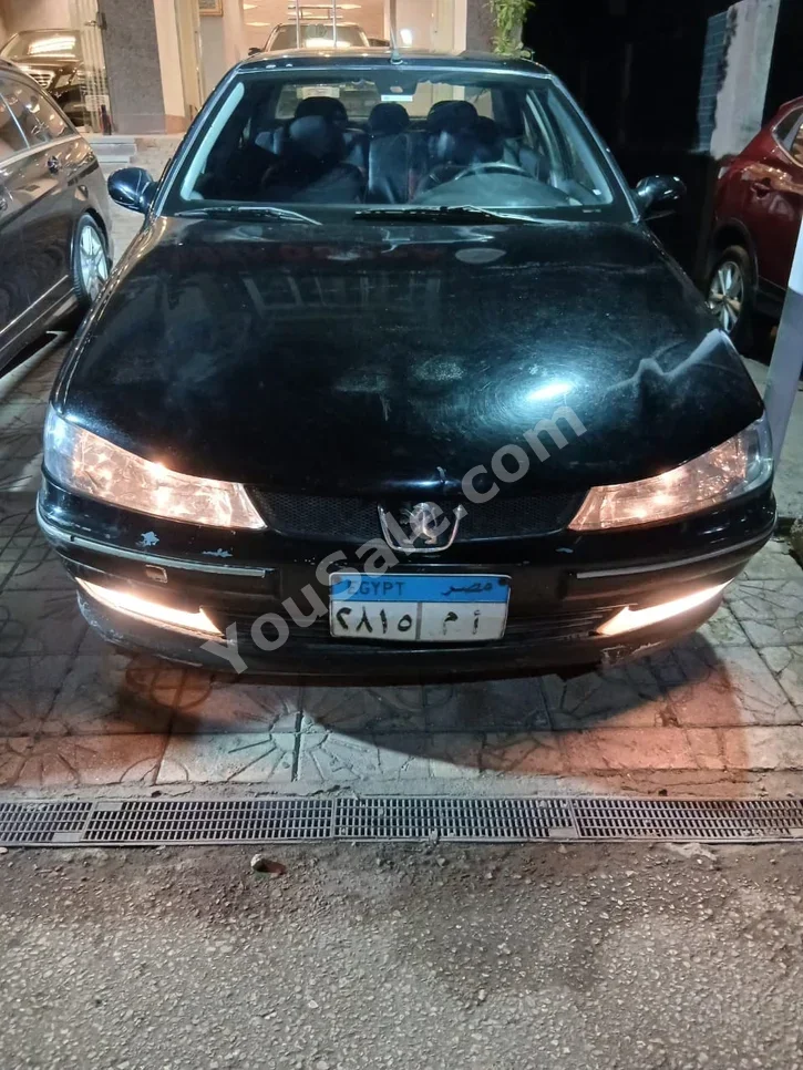 بيجو  405  2002  عادي  بيجو سلندر  560,000 كم  بيجو  أسود  بنزين