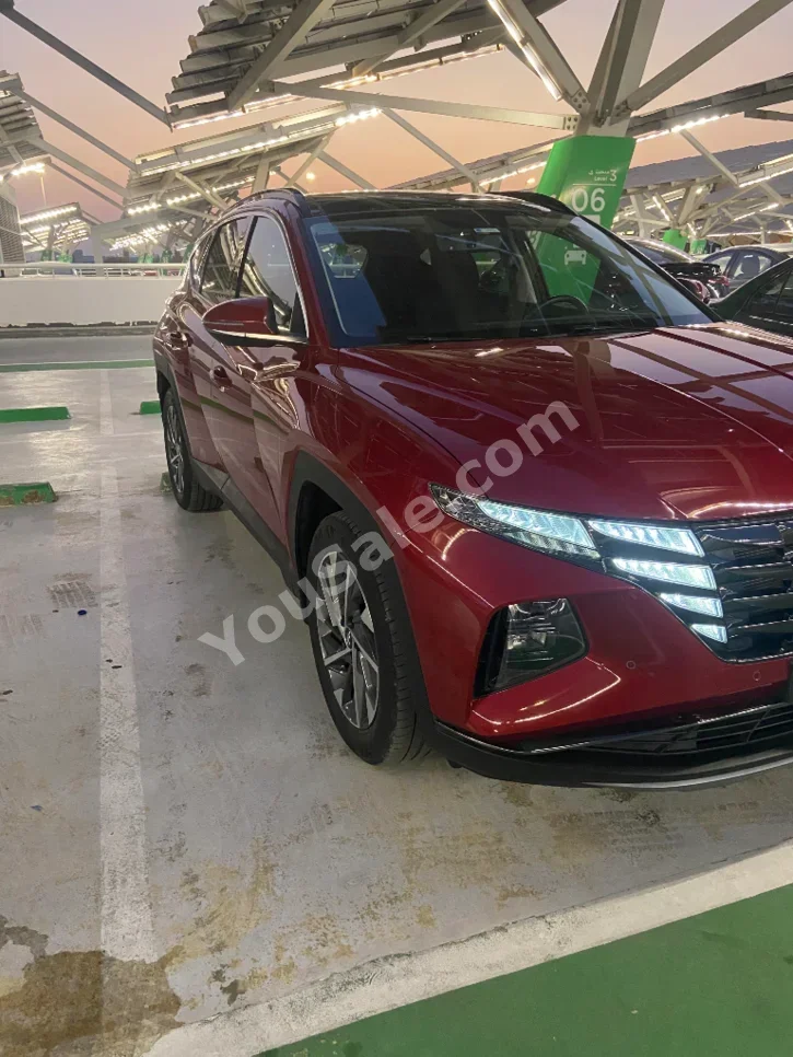 هيونداي توسان 2021 اس يو في ستبترونك 4 سلندر 40,000 كم دفع أمامي أحمر بنزين