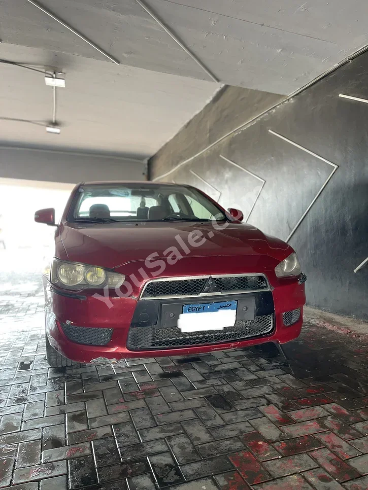 Mitsubishi  Lancer  2016  Sedan  Automatic  4 Cylinder  430,000 Km  FWD  Red  Gasoline