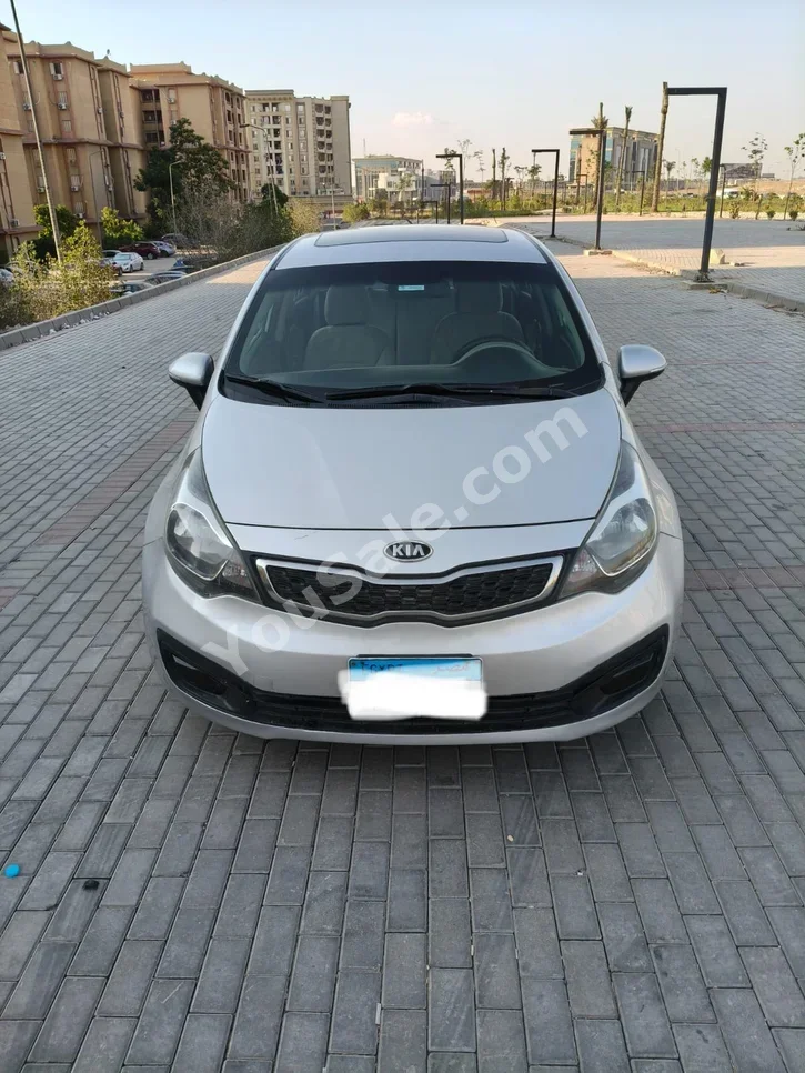 Kia  Rio  2013  Sedan  Automatic  4 Cylinder  80,000 Km  FWD  Silver  Gasoline